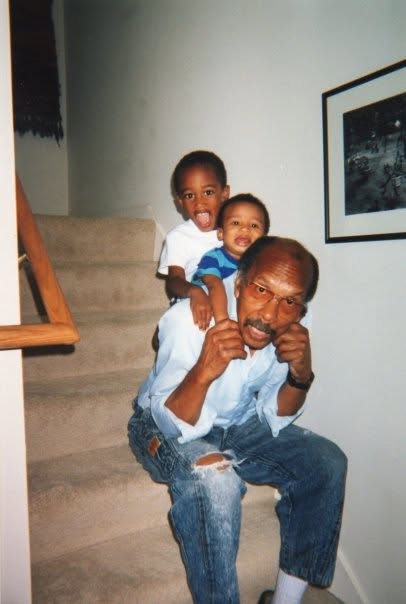 Jacob’s grandfather with two children on the stairs